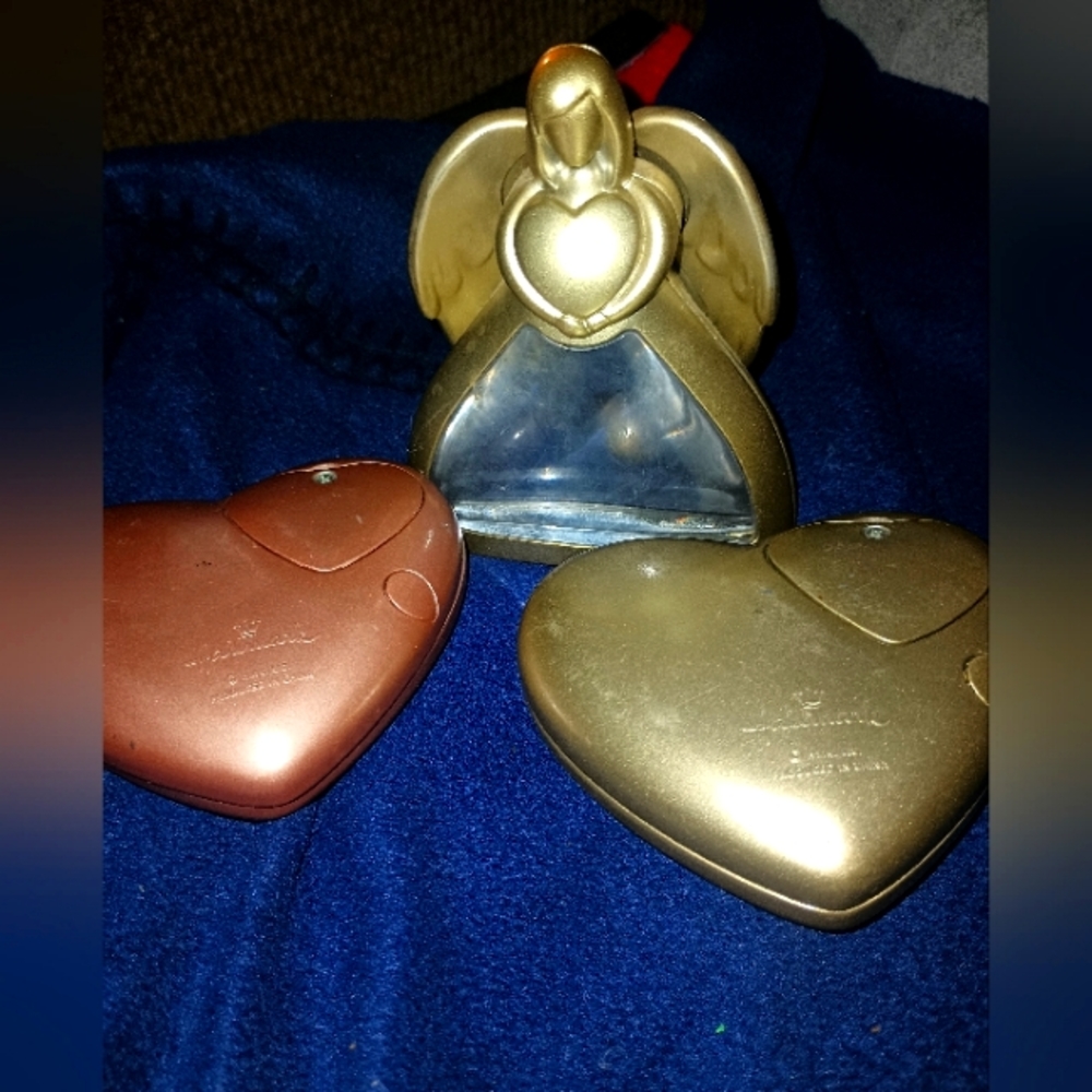 Collectable matching Hallmark with hidden compartment.